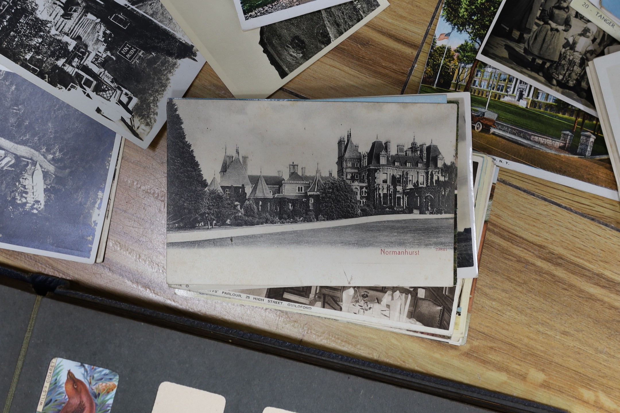 Collection of postcards, cigarette cards and ephemera
